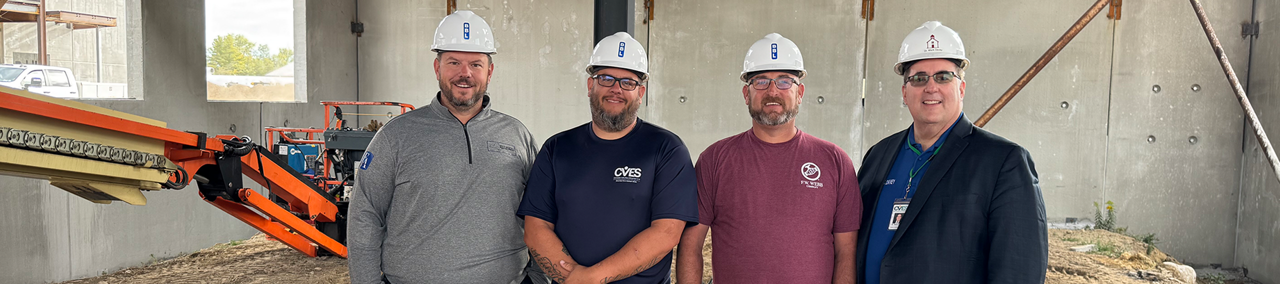 Management personnel with Operations and Maintenance staff